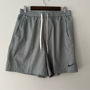 Nike Men’s Gray Athletic Drawstring Shorts with Black Swoosh